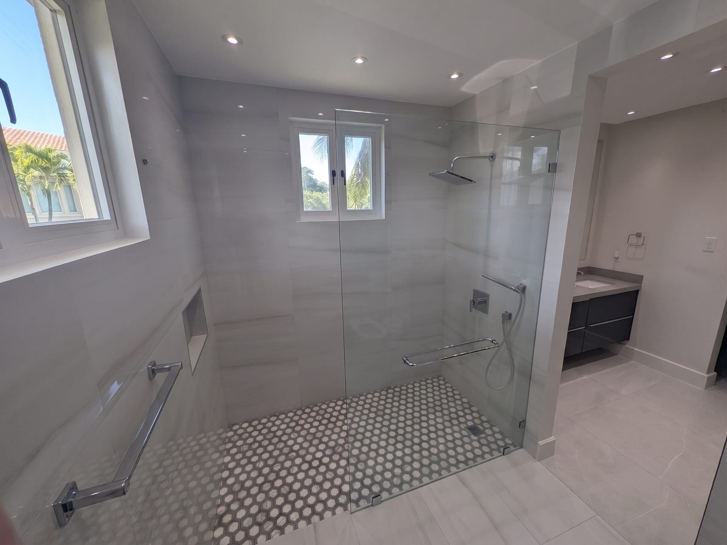 Primary bathroom with frameless glass walk-in shower